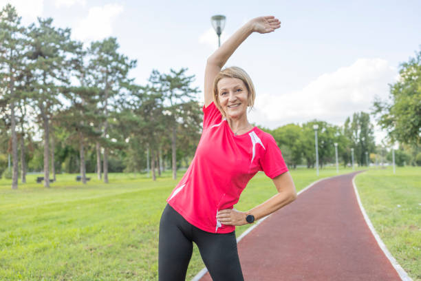 istock Fit woman stretching outdoors 1437192567