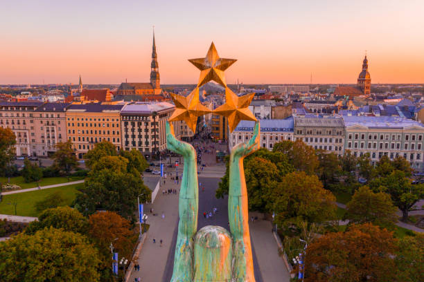 Amazing Aerial View of the Statue of Liberty Milda in Riga, Latv An amazing Aerial View of the Statue of Liberty Milda in Riga, Latvia during sunset latvia stock pictures, royalty-free photos & images