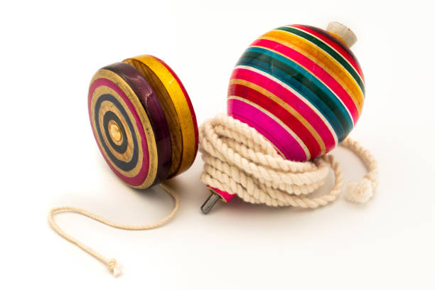 istock Colorful yo-yo and trompo on a white background 1437203973