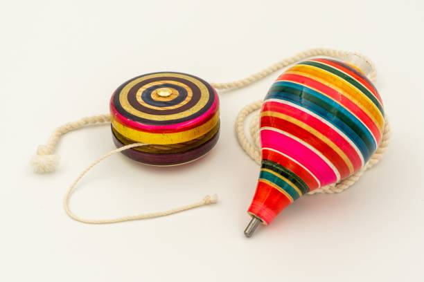istock Colorful yo-yo and trompo on a white background 1437203980