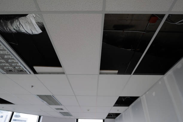 istock unfinished ceiling, installing fire sprinkler in office at building site. Electrical Installation, Electrical system Installation in building site. 1437204210