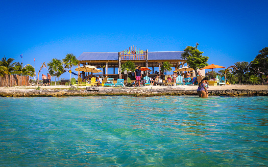 Ambergris Caye, Belize – February 17, 2019: A view of the popular Secret Beach area from the turquoise waters of the Caribbean Sea.