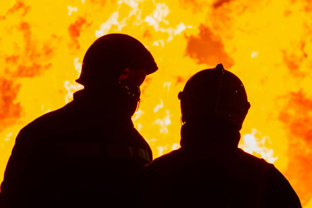 istock Firefighters putting out a fire. Destruction and disaster 1437208900