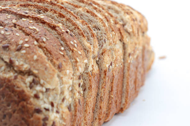Close-up sliced ​​wholemeal bread, on white background