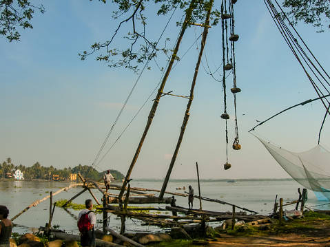 Kochi, Kerala, India - nov 11, 2005: detail of the stone counterweights used to lift heavy Chinese fishing nets out of the water in Kochi, Kerala