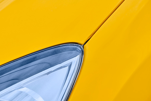 Yellow vehicle with head lamp