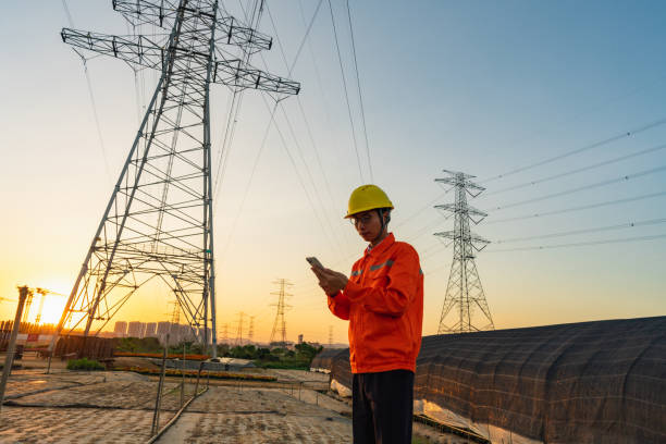 istock An electrician is on the phone at sunset 1437214434