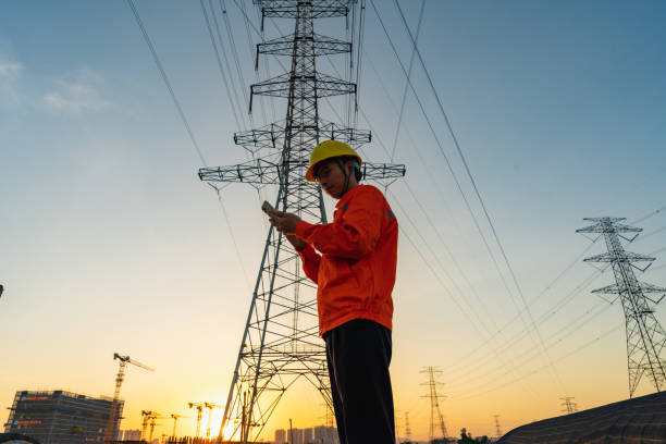 istock An electrician is on the phone at sunset 1437214435
