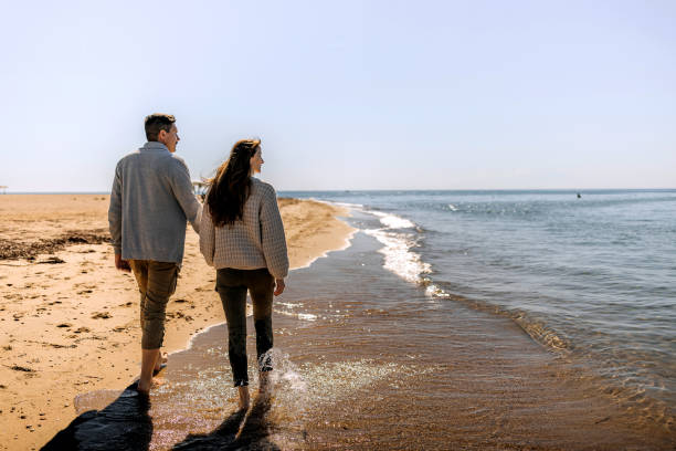 istock Couple enjoy vacation at the sea 1437214638