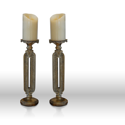 two brass candlestick,two white candle on white background, object, decor, modern, vintage, copy space
