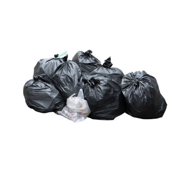 istock pile of garbage black bag  isolated on white background 1437220728
