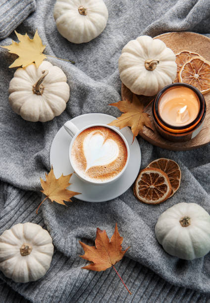 istock White pumpkins, coffee and autumn leaves 1437222514