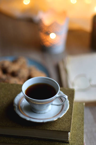 istock Cookies, Tea, Books and Candle 1437223046