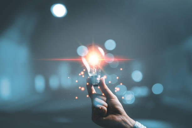 istock woman Hand holding Light bulb Global Internet connection. Business global internet connection application technology and digital marketing, Financial and banking, Digital link tech, big data. 1437223717