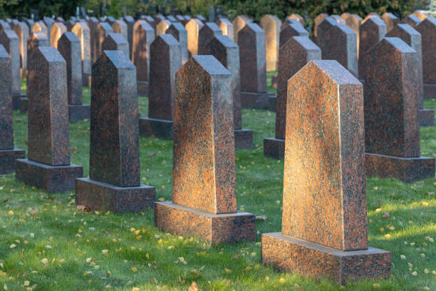 istock empty stone tombstone in a military cemetery. 1437224910