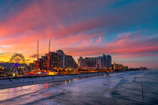 Colorful sunset above Daytona Beach, Florida, photographed from the fishing pier.