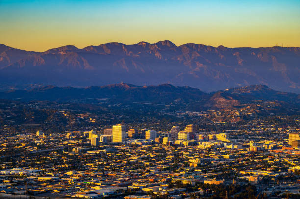 Sunset above downtown Glendale and San Gabriel Mountains in California stock photo