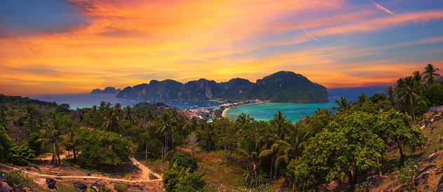 Panoramic sunset view over the Tonsai Village and the mountains of Koh Phi Phi Island in the Krabi province, Thailand