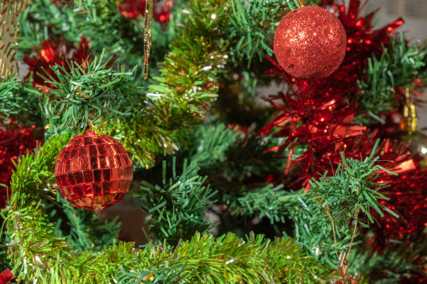 istock Christmas and New Year Decoration. Baubles hanging on Christmas Tree. 1437229256