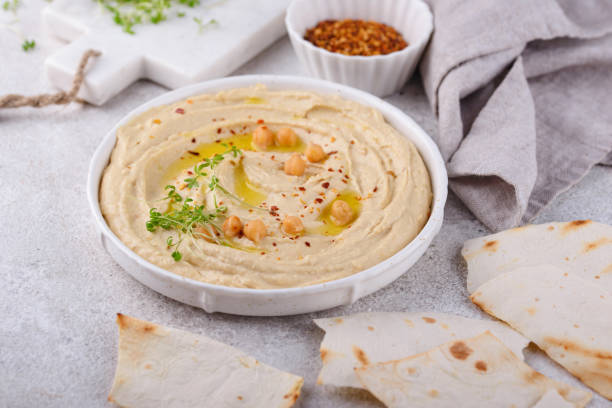 Hummus from chickpeas and pita bread. stock photo