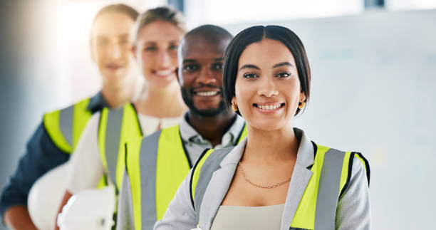 Diversity, team and portrait of engineering employees standing in an industrial office. Industry workers working on a site development project together in a corporate room at the staff warehouse. Diversity, team and portrait of engineering employees standing in an industrial office. Industry workers working on a site development project together in a corporate room at the staff warehouse. warehouse office stock pictures, royalty-free photos & images