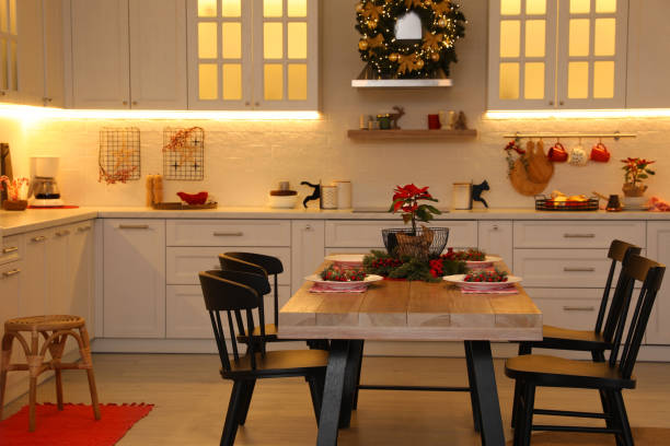 istock Cozy dining room interior with beautiful Christmas wreath and festive decor 1437238636