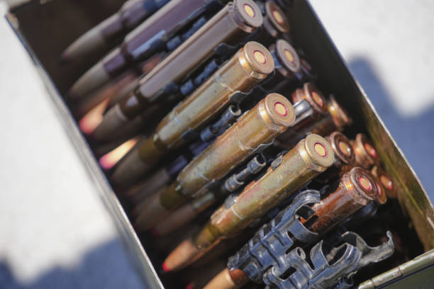 istock Machine gun belt loaded with cartridges 1437239483