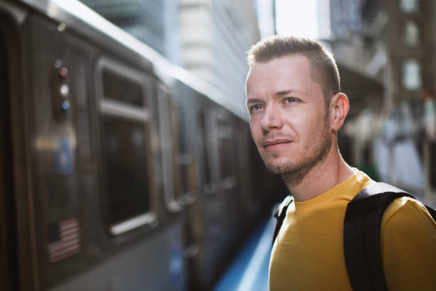 Portrait of man waiting to commuting train