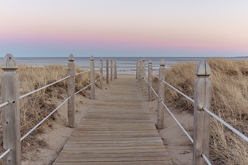 Marbella Artola Dunes and beach in Cabopino natural park at sunset with Senda Litoral footpath walkway in Costa del Sol of Malaga in Andalusia Spain