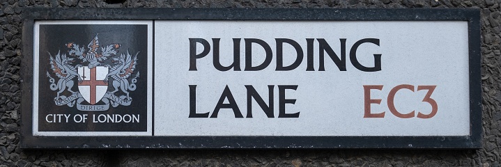 London, United Kingdom – April 11, 2019: The street sign in Pudding Lane, London where the great fire of London started in 1666.