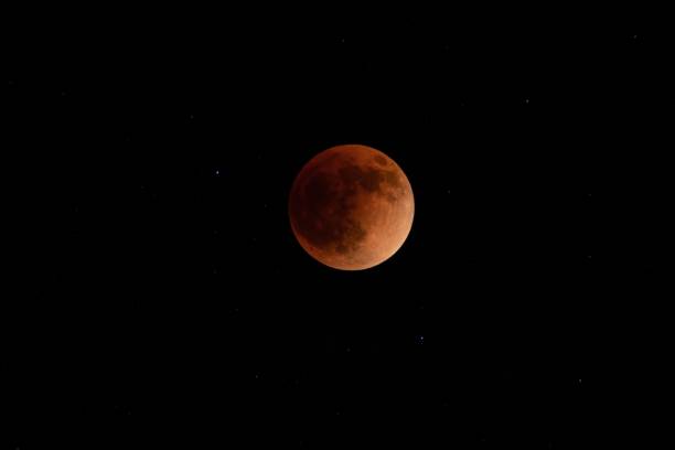 istock Beautiful shot of Lunar eclipse in the dark sky 1437247035