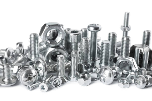 istock Different metal bolts and nuts on white background 1437250031