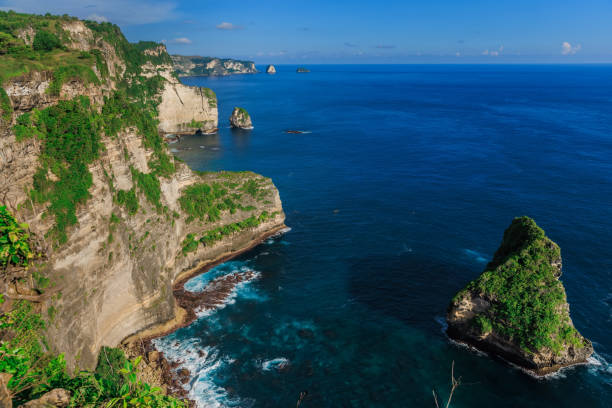istock Scenic cliffs with blue ocean in Nusa Penida island 1437257908