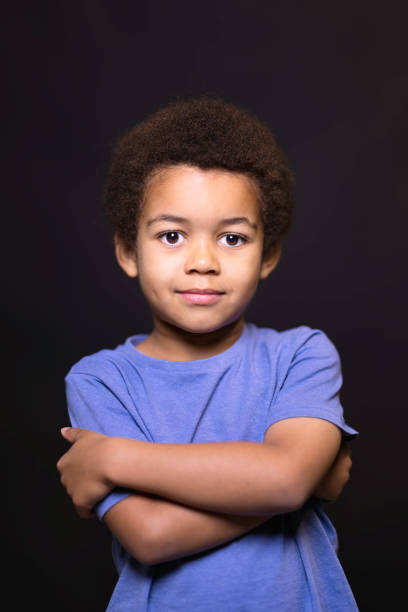 istock Five-year-old boy wearing a blue t shirt 1437262900