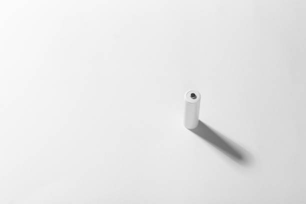 istock AA size alkaline battery on a white background. Accumulator. 1437263759