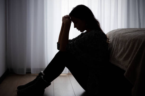 istock Depressed woman. Sadness and headache concept 1437265222