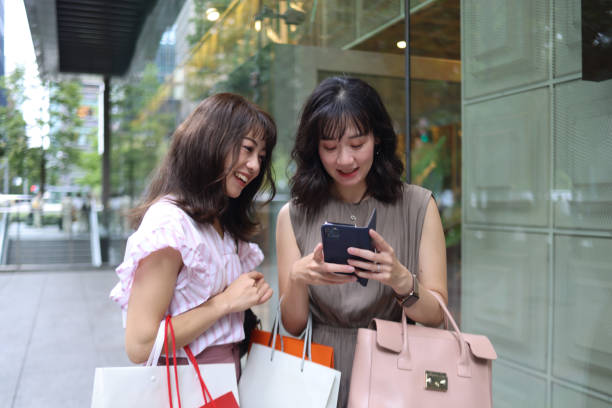 istock Beautiful young wmen checking a shopping list 1437265786