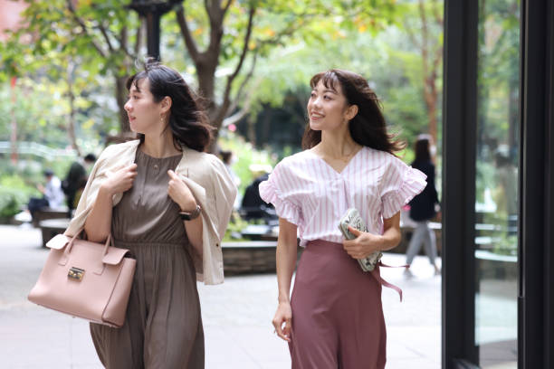 istock Beautiful young wmen enjoying shopping 1437266511