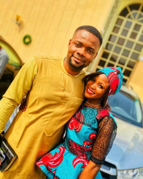 istock African Couple wearing African Fabrics 1437268973