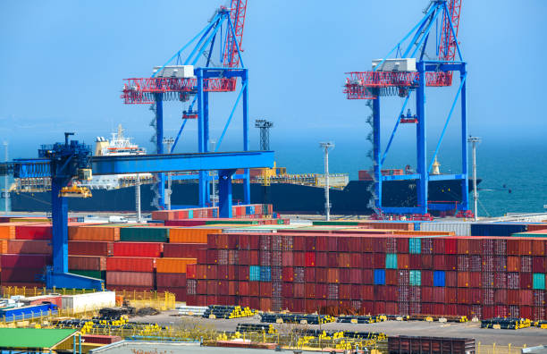 istock industrial seaport infrastructure, sea, container ship and cranes, commercial dock with container warehouse, maritime cargo transportation concept 1437272726