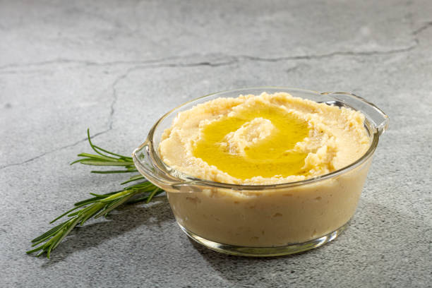 istock Chickpeas hummus with olive oil in the bowl. 1437274405