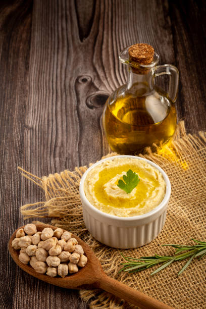 istock Chickpeas hummus with olive oil in the bowl. 1437274511