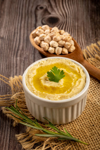 istock Chickpeas hummus with olive oil in the bowl. 1437274536