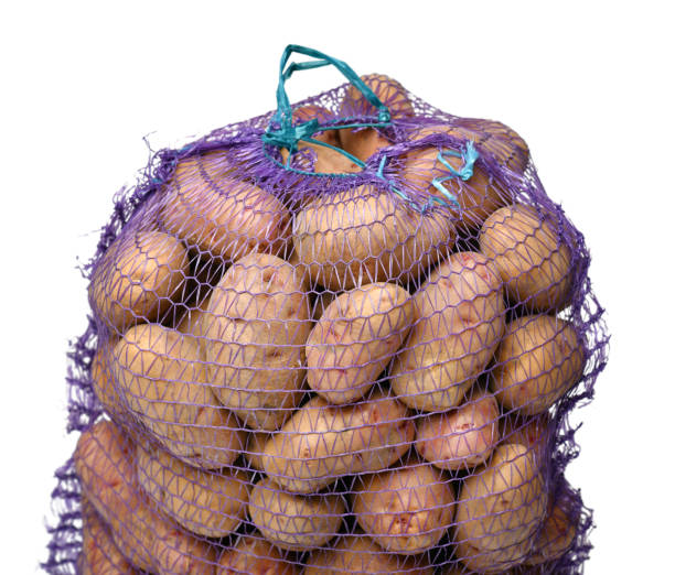 istock a bag of potatoes, the object is isolated on a white background 1437274873