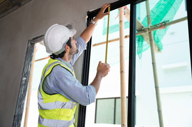 istock Mechanical Engineer working with use tape measure on construction home building site 1437279036