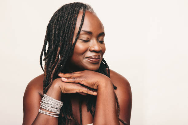 istock Beautiful woman with dreadlocks smiling with her eyes closed 1437284377