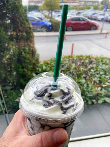 istock Milkshake, drinking milkshake in the outdoors cafe 1437291286