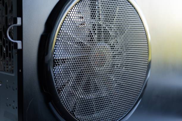 istock Closeup shot of a big cooling fan on a computer black case 1437294304