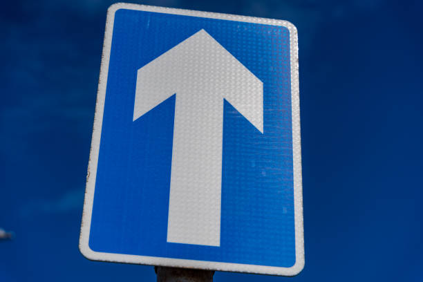 istock One way sign set against a blue sky 1437299024