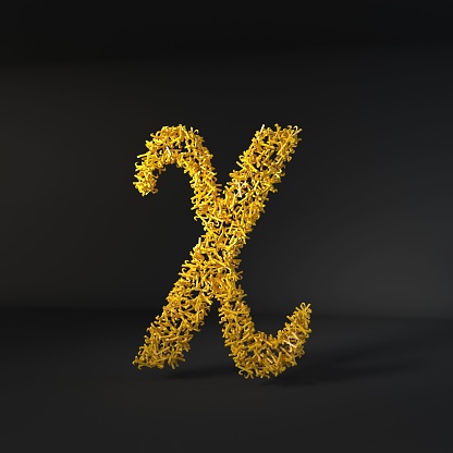 Scattered yellow letter isolated over a black background